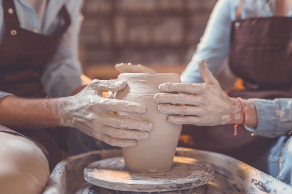 Young couple in pottery closeup